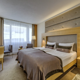 Bett im Doppelzimmer Economy im Hotel Continental