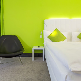 Bett in der Family Suite im Hotel City Inn